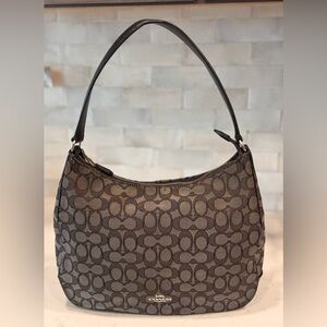 Coach Signature Monogram Hobo
Bag with Leather Strap